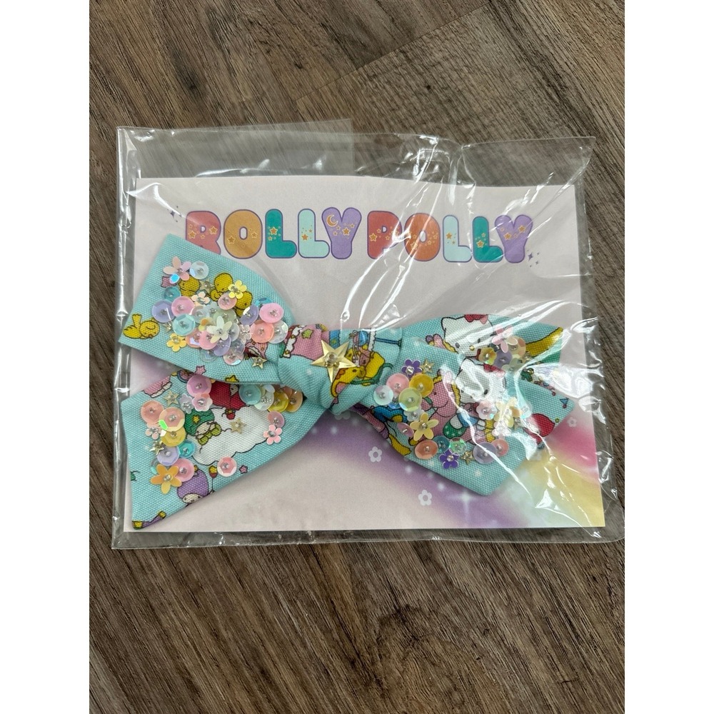 blue hello kitty bow rolly polly